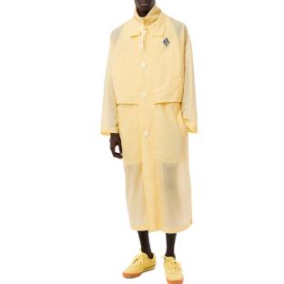 Pasarela LACOSTE hombre amarillo parka larga transparente ver 0
